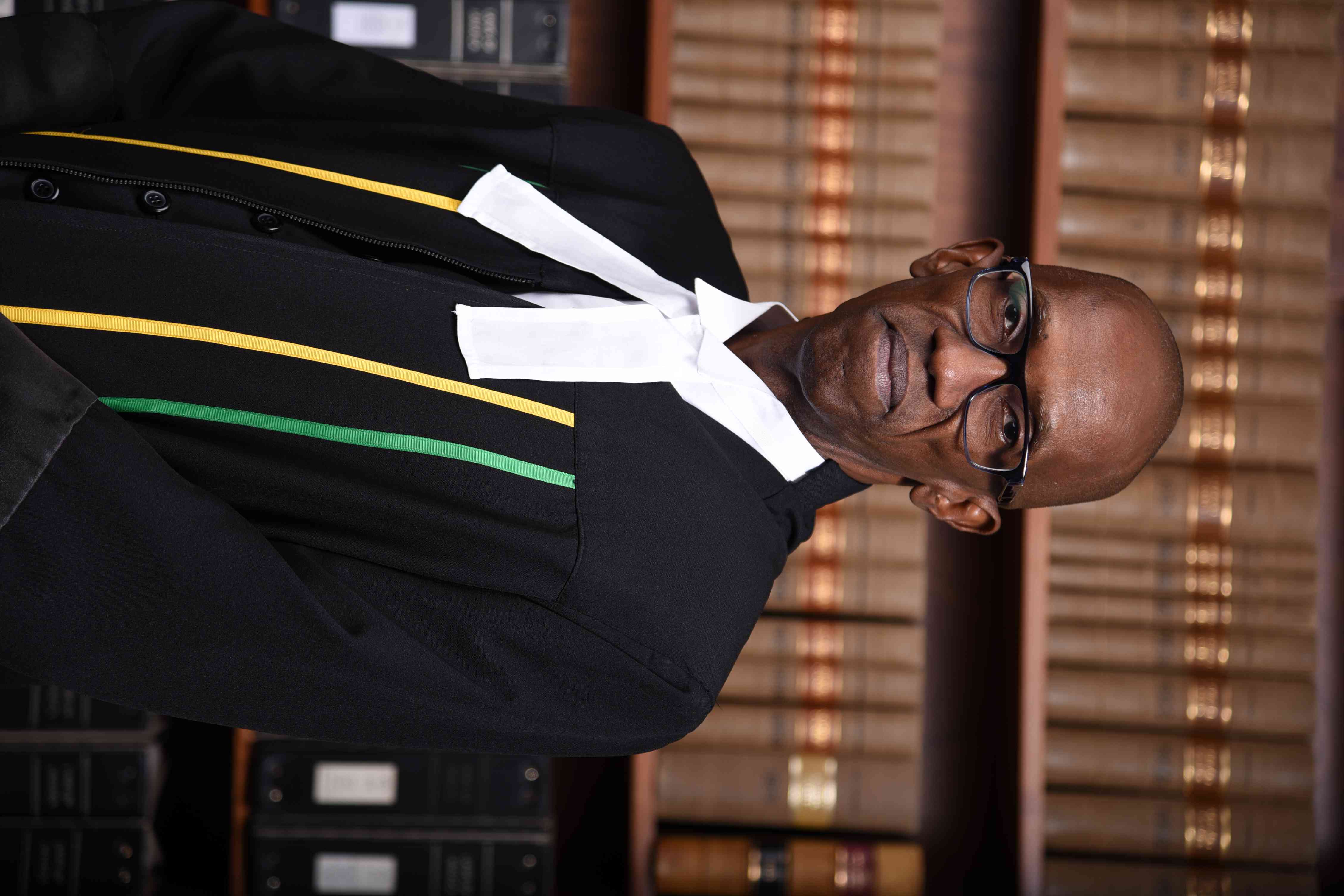 The Honourable Mr Justice Frank Williams, JA
